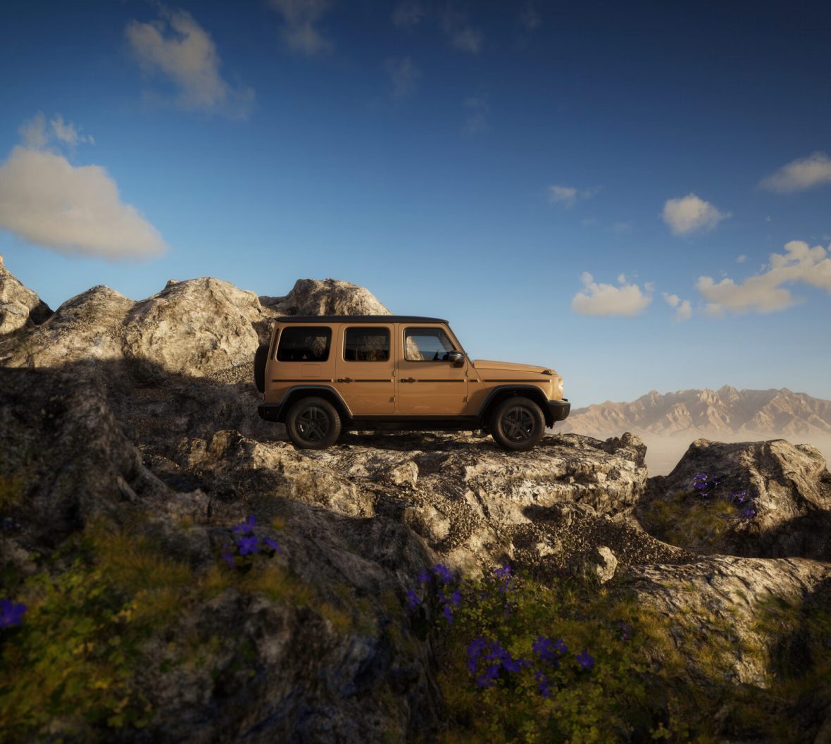 Mercedes-Benz G-Klasse in einer weiten Berglandschaft.